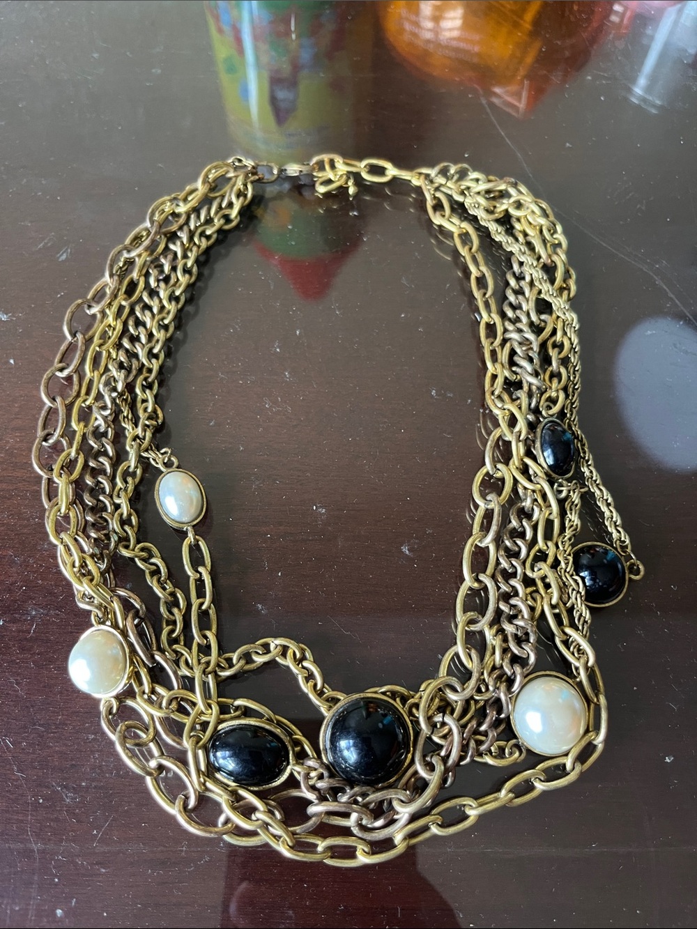 Gold-Tone Multi-Strand Necklace with Black and White Beads